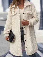 Cream textured shacket-coat with patch pockets and button front.
