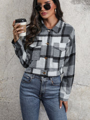 Checked plaid shacket in dark gray with patch pockets and button closure.