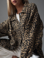 Oversized leopard wash denim jacket with button front and collar.