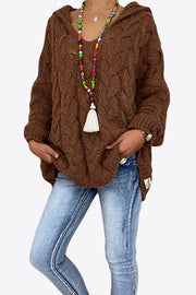 Brown cable knit hooded cocoon sweater with relaxed fit and V-neck