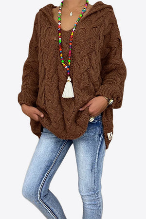 Brown cable knit hooded cocoon sweater with relaxed fit and V-neck