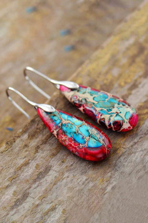 Teardrop jasper drop earrings with red, blue, and pink natural stone patterns and silver hooks.