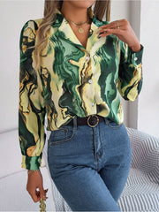 Yellow-green abstract swirl print silk blouse with button front and long sleeves