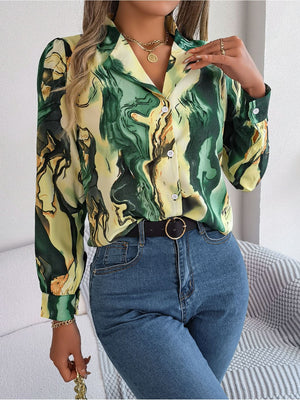 Yellow-green abstract swirl print silk blouse with button front and long sleeves