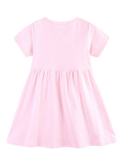 Pink cotton baby dress with short sleeves, round neck, and gathered skirt.
