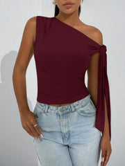 Burgundy asymmetrical tie detail cropped blouse with one shoulder and split sleeve.