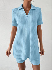 Light blue ribbed polo shirt and shorts co-ord set with a v-neck and collar.
