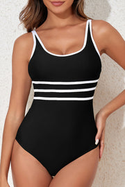Black one-piece swimsuit with white stripe trim and scoop neckline