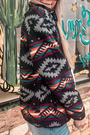Black Aztec print fleece zip-up jacket with a full zipper and collar.