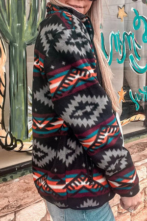 Black Aztec print fleece zip-up jacket with a full zipper and collar.