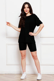 Black relaxed tee and biker short co-ord set with crew neck and short sleeves.