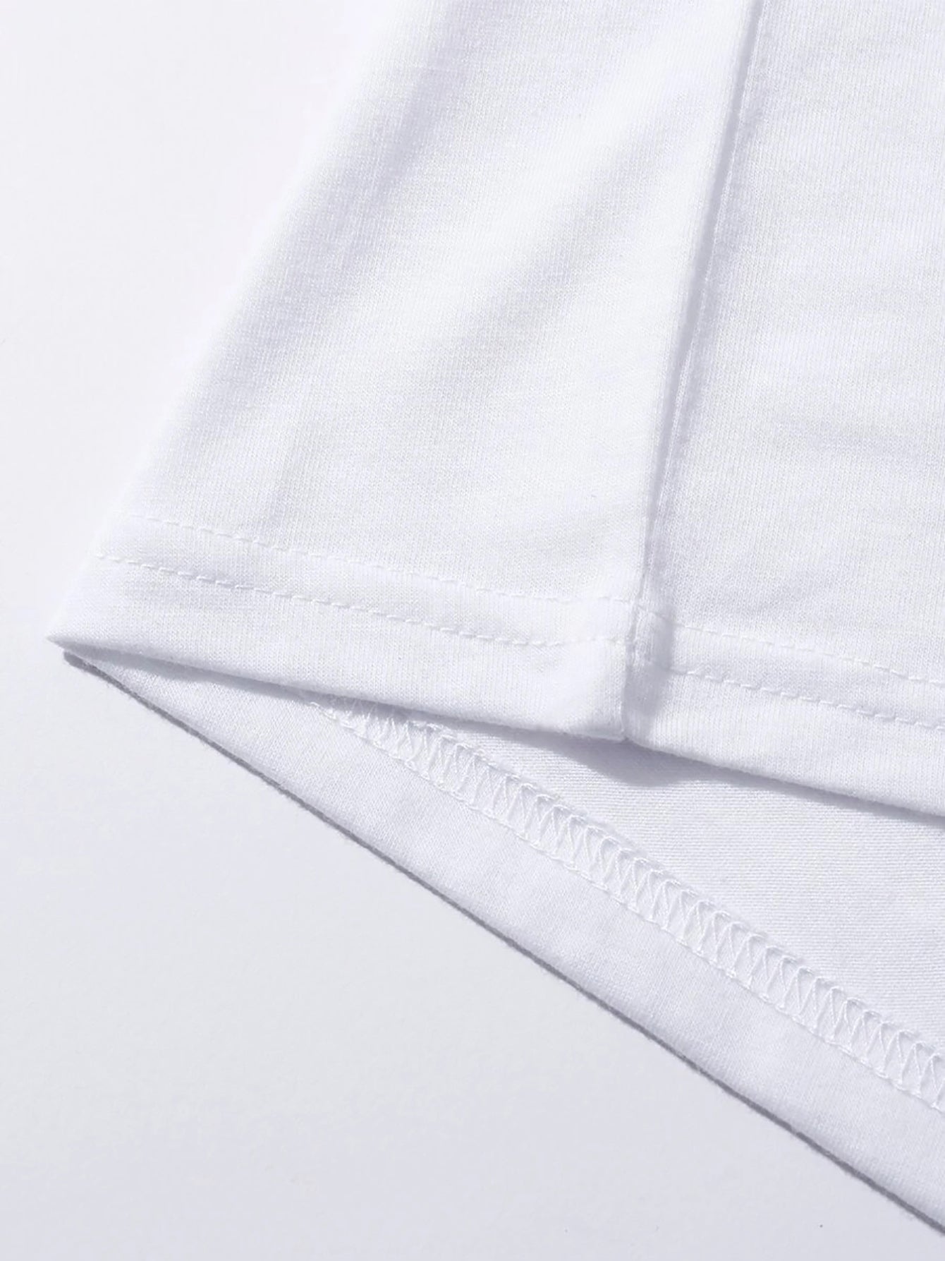 White t-shirt hem detail with double stitching