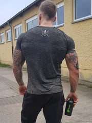 Performance knit t-shirt in dark gray with a textured pattern and logo on the back.