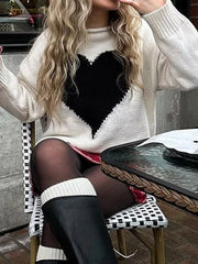 Gray/white acrylic blend sweater with a large black heart print and dropped shoulders.