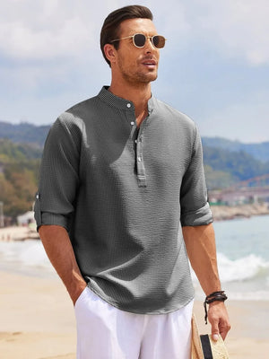 Textured henley collar shirt in dark gray with roll-up sleeves and button detail