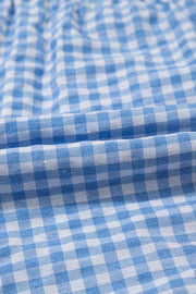 Light blue gingham boxer-style shorts with a high-rise fit.