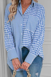 Light blue gingham oversized shirt with patch pocket and button front.