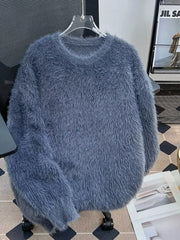 Blue fluffy knit pullover sweater with crew neck and long sleeves.