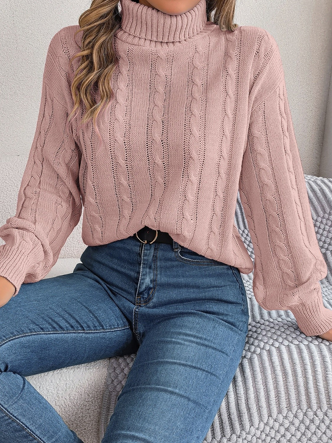 Dusty pink cable knit turtleneck sweater with voluminous sleeves, acrylic knit.