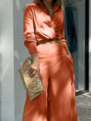 Chic two-piece set in ochre polyester with pocketed wide-leg pants and a collared crop top.