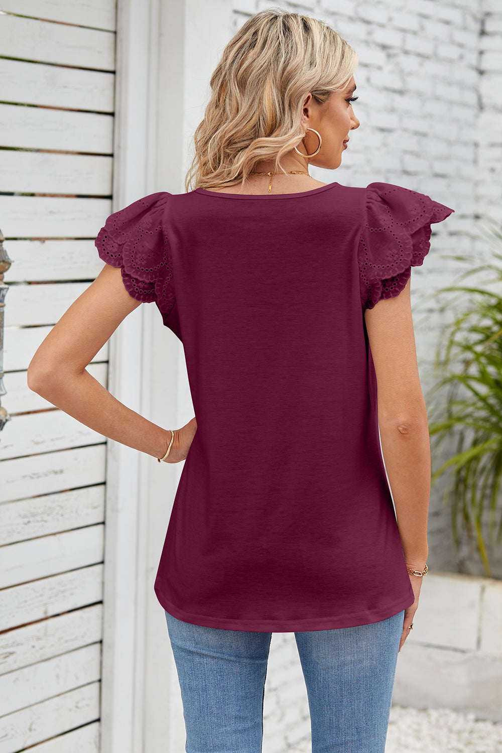 Deep purple eyelet flutter sleeve square neck top with casual styling.
