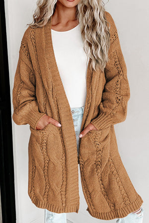 Camel cable knit open-front cardigan with pockets and openwork sleeves.