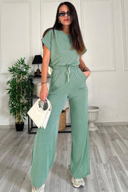 Relaxed fit tee and wide leg pants set in Gum Leaf green with drawstring waist and cuffed sleeves.