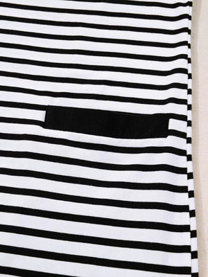 Black and white striped collared dress with a black pocket detail.
