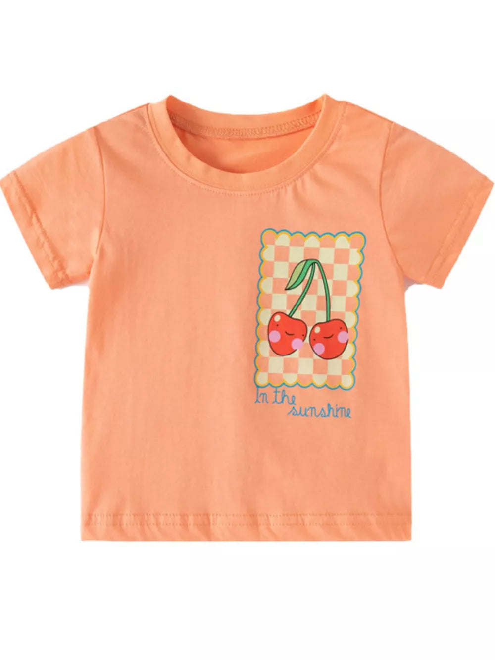 Toddler t-shirt in peach with a cheerful cherry graphic and "in the sunshine" text.