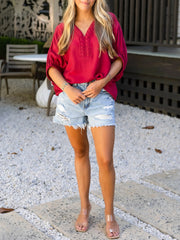 Braided V-neck deep red half sleeve blouse with embroidered detail