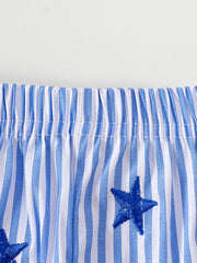 Baby outfit set with blue and white stripes and embroidered stars.