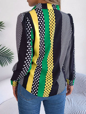 Panelled print collared blouse with polka dots and stripes in black, yellow, green, and white.