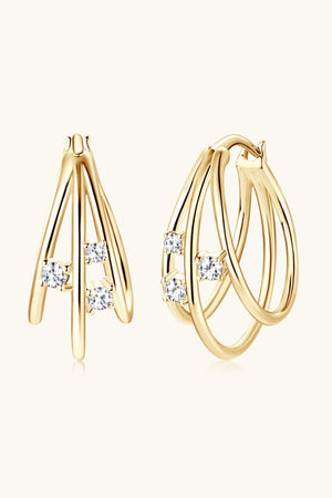 Gold hoop earrings with sculptural design and cubic zirconia accents