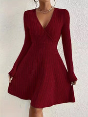 Burgundy ribbed wrap mini dress with long sleeves and V-neck.