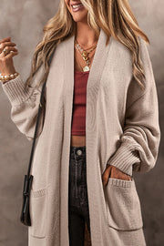 Oversized sleeve maxi cardigan in Dust Storm with pockets and ribbed cuffs.
