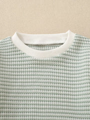 Baby knit set in light green waffle texture with white ribbed crew neck.