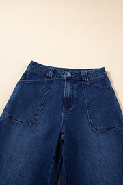 Mid-rise straight leg jeans in dark wash denim with button closure and large front pockets.