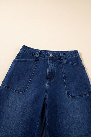 Mid-rise straight leg jeans in dark wash denim with button closure and large front pockets.