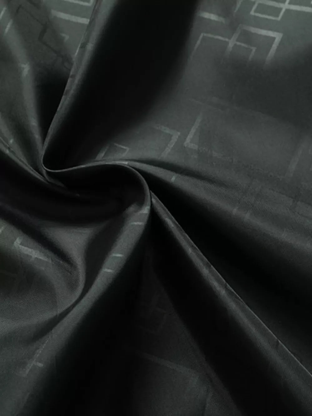 Black hooded jacket fabric with subtle geometric pattern detail