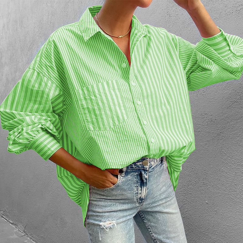 Neon green striped oversized button-down shirt with pocket and cuffed sleeves.