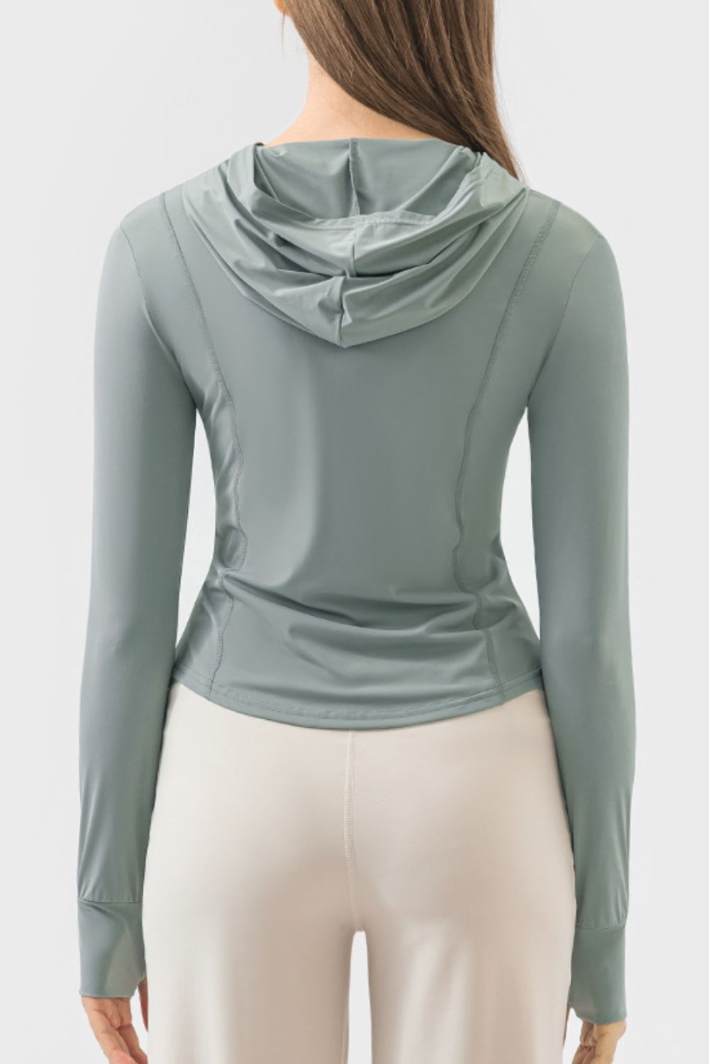 Teal active hoodie with thumbholes and a sculpted fit, shown from the back.