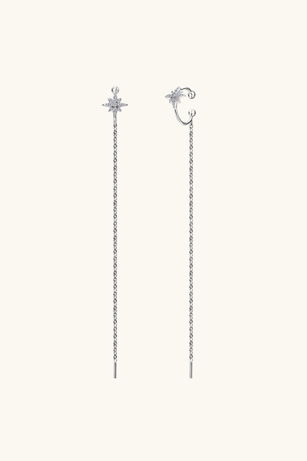 Silver threader earrings with moissanite starburst tops and long delicate chains.