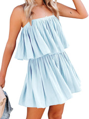 Light blue tiered cami romper with delicate straps and a square neckline.