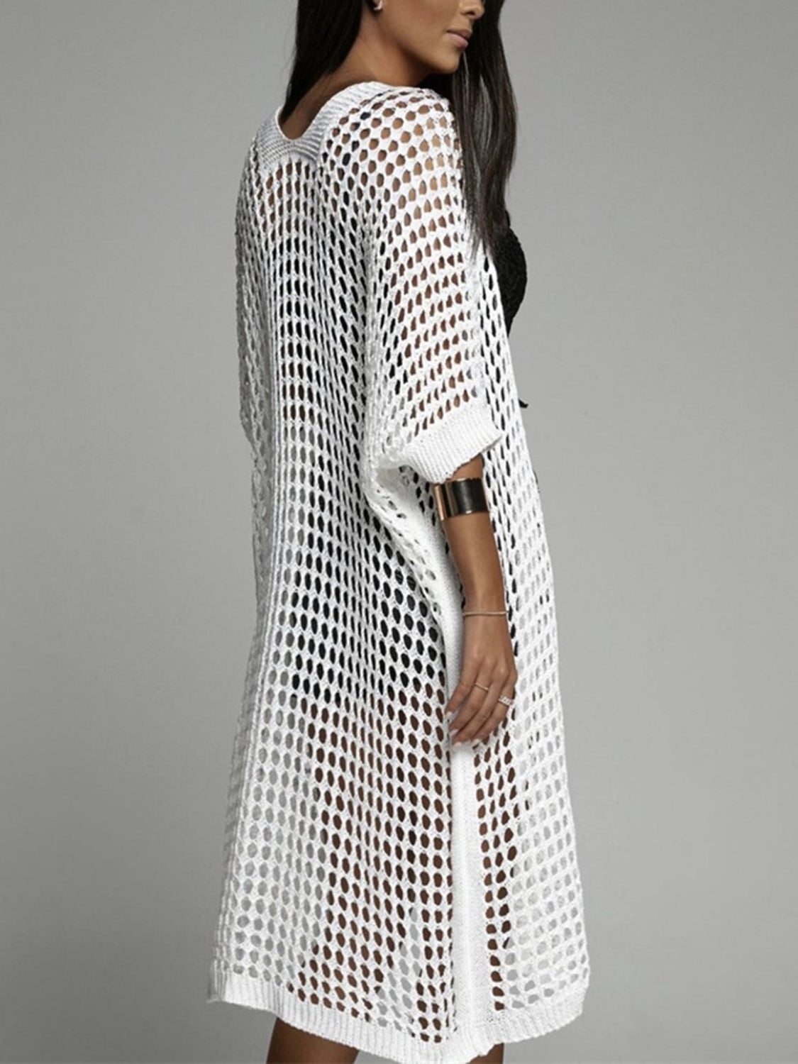 White open-knit duster cardigan with short sleeves and a relaxed fit.
