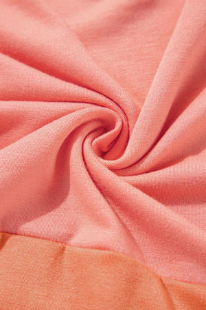 Colorblock drape batwing blouse in sherbet pink and orange cotton blend fabric.