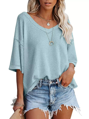 Light blue waffle knit relaxed v-neck t-shirt with short sleeves.