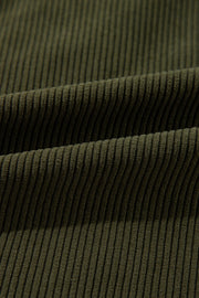 Moss corduroy fabric detail of a bomber jacket