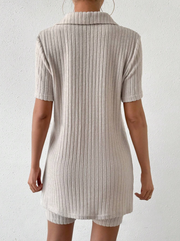 Textured ribbed polo and shorts set in tan with short sleeves and a collar.
