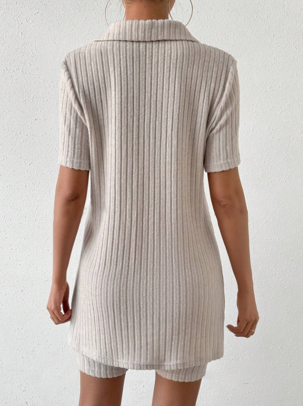 Textured ribbed polo and shorts set in tan with short sleeves and a collar.