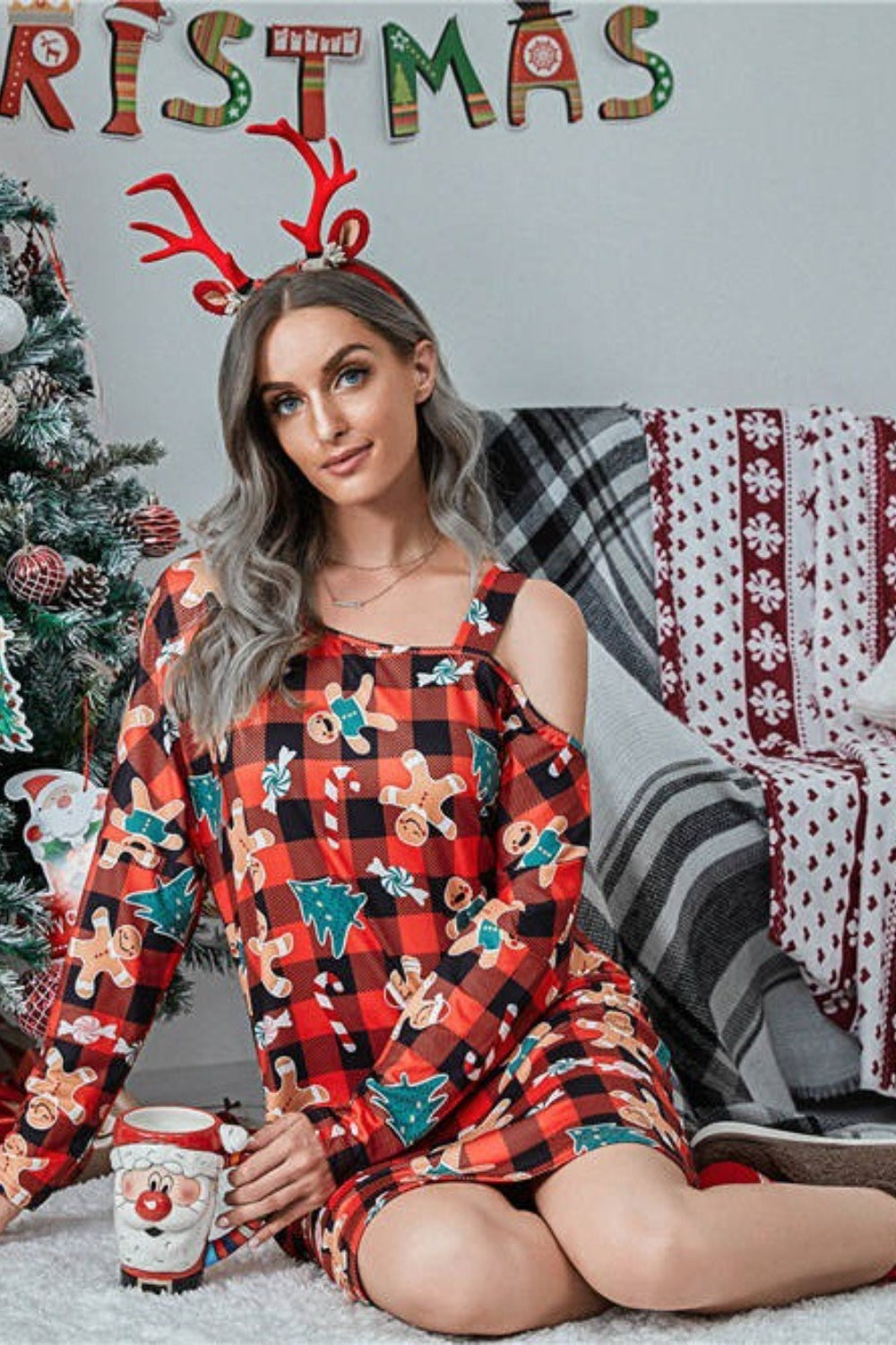 Cold shoulder dress in red plaid with gingerbread man and Christmas tree print.
